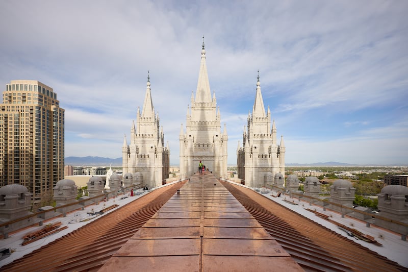 Crews install a new copper roof on the Salt Lake Temple of The Church of Jesus Christ of Latter-day Saints on Tuesday, April 21, 2026, in Salt Lake City.