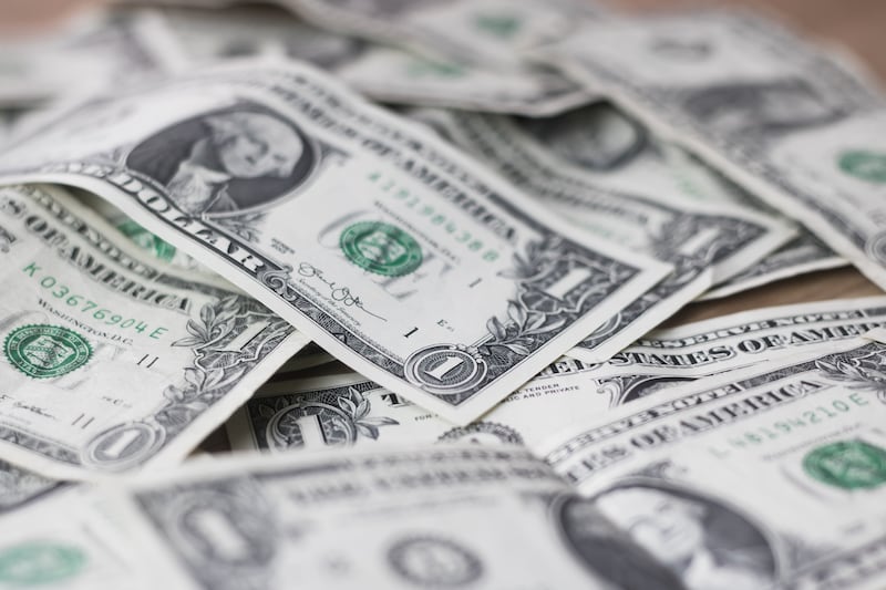 Pile of American one dollar bills