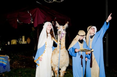 The Clifton family, members of the McLean Virginia Stake participate in the drive-thru Nativity and food drive hosted on Dec. 11 an 12, 2020.