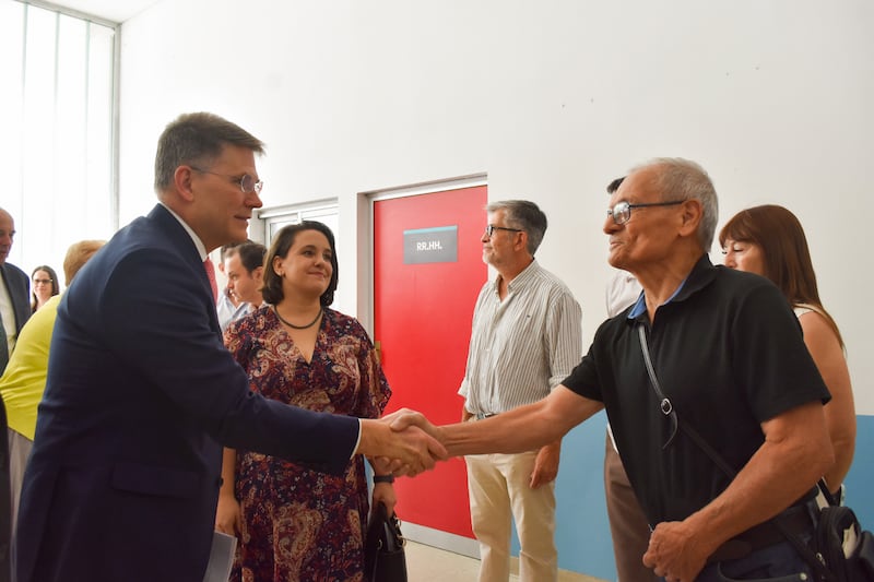 Bishop Sean Douglas, second counselor in the Presiding Bishopric, left, greets a man while touring facilities at a hospital where the Church donated new medical equipment in Belén de Escobar, Buenos Aires Province, Argentina, on Feb. 14, 2026.