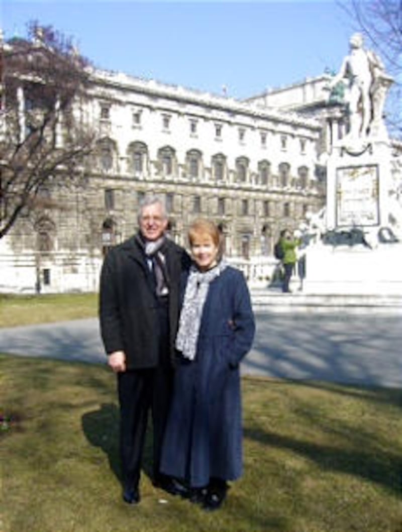Elder D. Todd Christofferson and Sister Katherine Jacob Christofferson in front of monument of Mozar