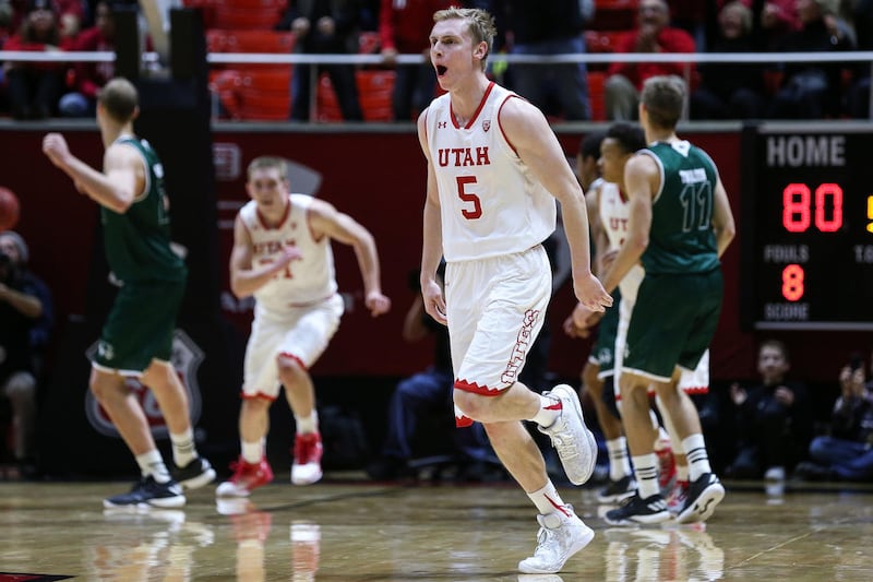 Utah Utes guard Parker Van Dyke celebrates after making a shot to regain the lead over Utah Valley University during a game at the Huntsman Center in Salt Lake City on Tuesday, Dec. 6, 2016.