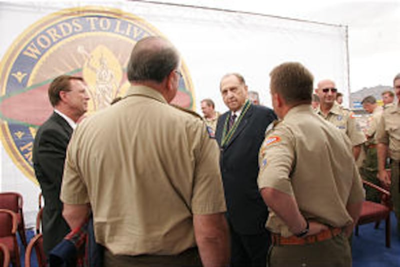 In his message, President Thomas S. Monson challenged Scout leaders to join him in building boys int