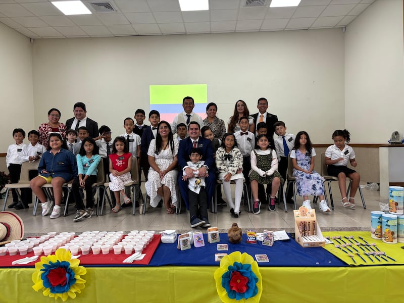 Primary children and leaders of the Samborondón Ecuador Stake pose for a photo with the Colombian flag during the stake's mini missionary training center activity in Guayaquil, Ecuador, Feb. 21, 2026.