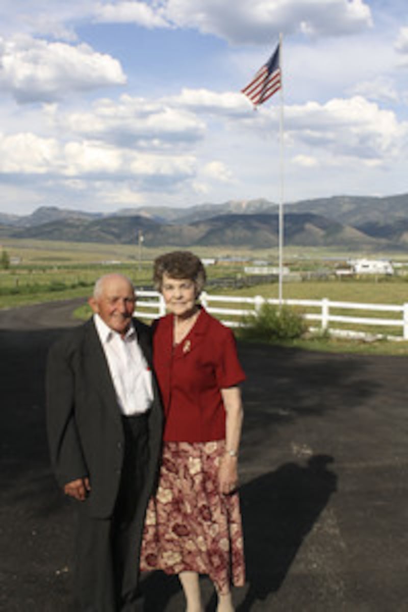Ivan Bruderer, who witnessed marines raise an American flag on Iwo Jima, stands with his wife, Ellen
