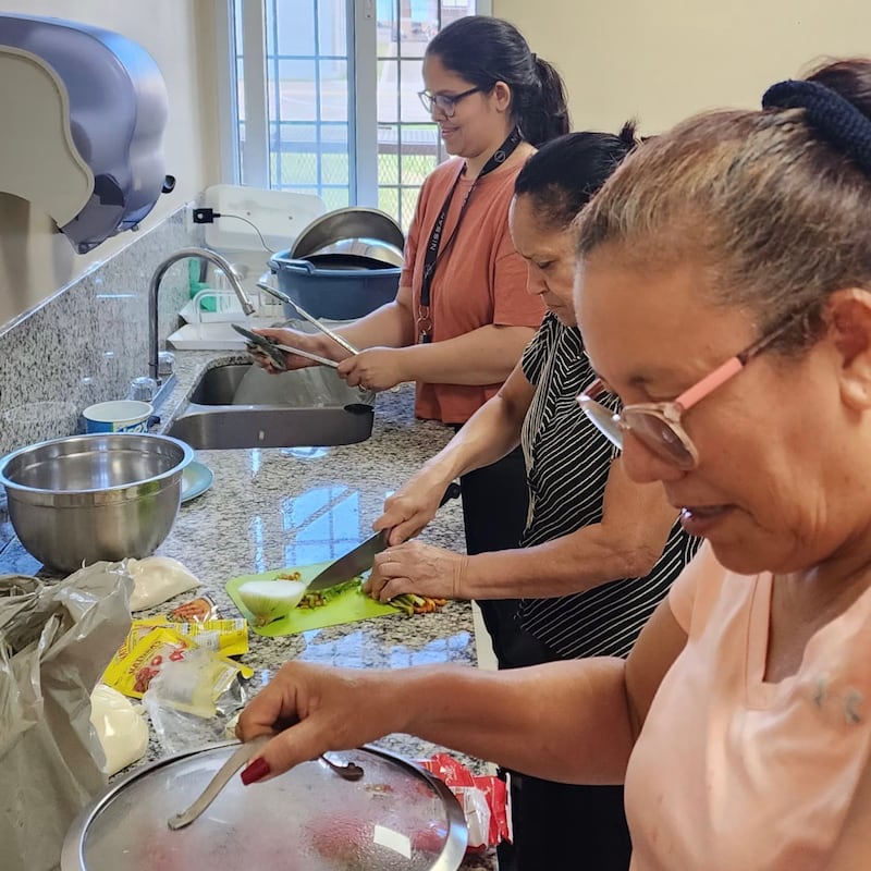 Members of The Church of Jesus Christ of Latter-day Saints in Juticalpa, Honduras, prepare meals for others during Holy Week in March 2026.