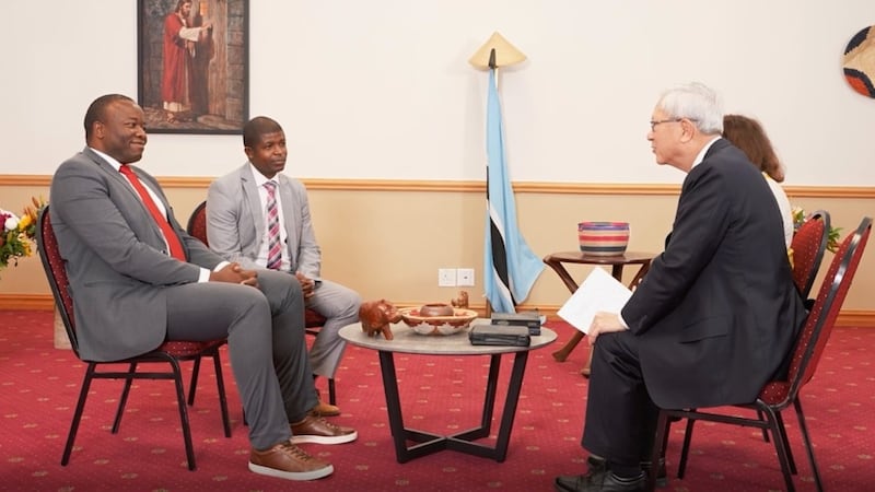 Elder and Sister Gong speak with two Church leaders from Botswana in Johannesburg, South Africa, May 16, 2026.