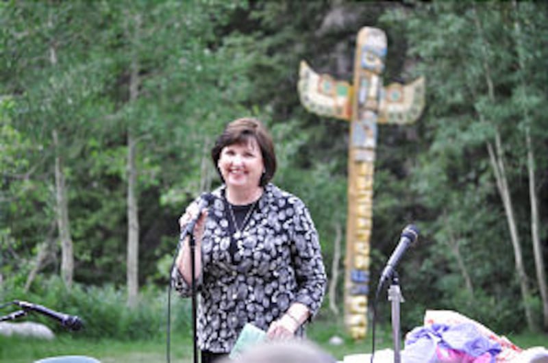 Sister Ann M. Dibb, second counselor in the Young Women general presidency, at Brighton Camp 90th An