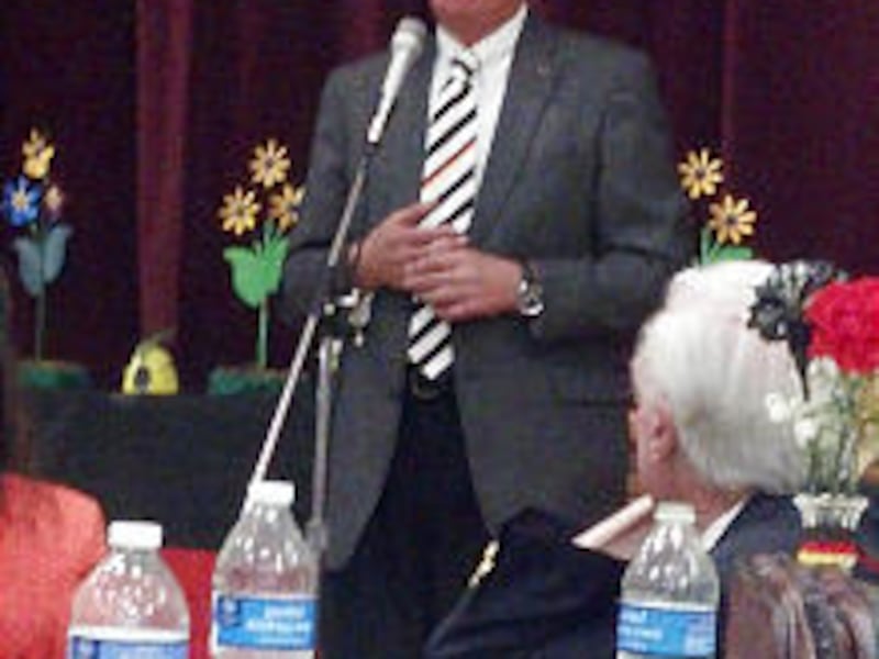 President Dieter F. Uchtdorf addresses members and former members of the German Speaking Ward at a 5