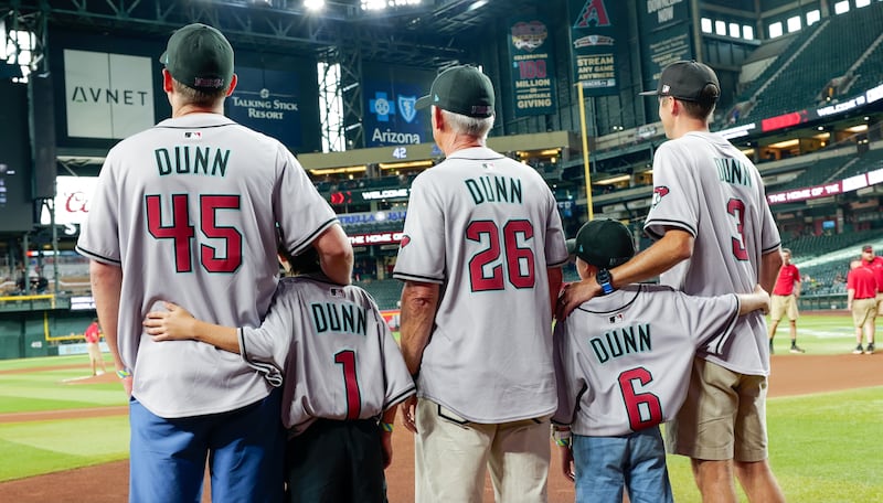 Elder Michael A. Dunn, General Authority Seventy, center, enjoys an Arizona Diamondbacks baseball game in Phoenix, Arizona, on Monday, July 20, 2026.