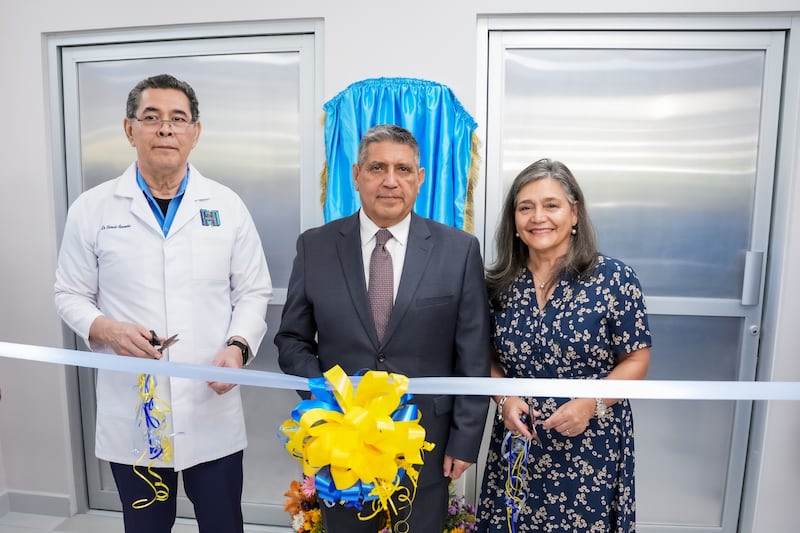 A hospital official joins Elder Patricio M. Giuffra and Sister María Eugenia Giuffra in the ribbon-cutting of a new women's clinic in Managua, Nicaragua, on Sept. 4, 2026.