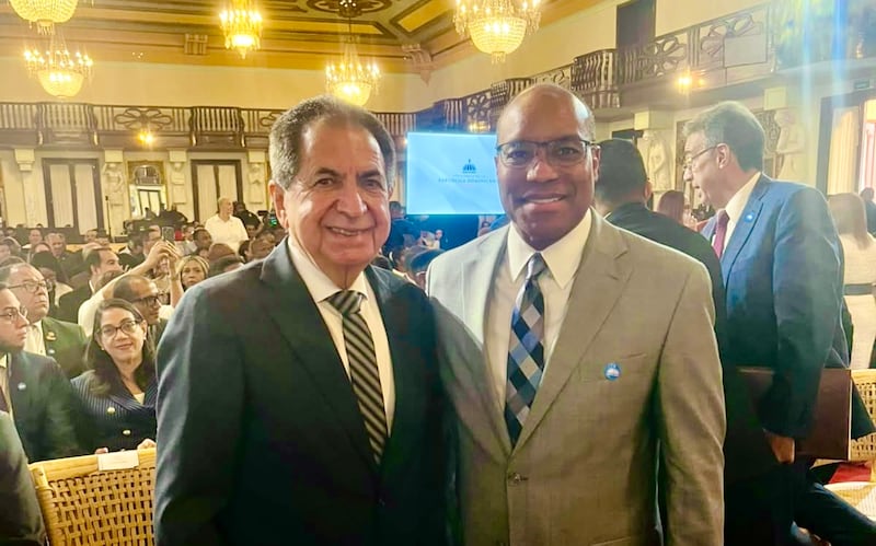 Elder Ahmad S. Corbitt, a General Authority Seventy and a member of the Caribbean Area presidency, right, stands with Pastor Milcíades Franjul, director of the Christian Liaison Office to the Executive Branch, at a national day of prayer and thanksgiving interfaith event held Sept. 7, 2026, in the Hall of Caryatids at the National Palace in Santo Domingo, Dominican Republic.