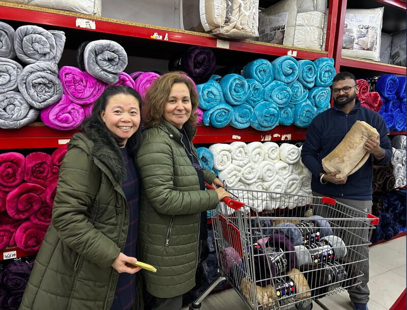 Latter-day Saint volunteers in Portugal gather and organize donated blankets in February 2026 after deadly storms hit the country.