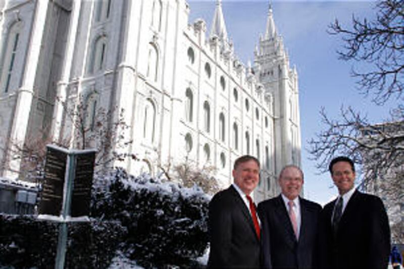 Sunday School general presidency stands on grounds of Salt Lake Temple. Brother Russell T. Osguthorp