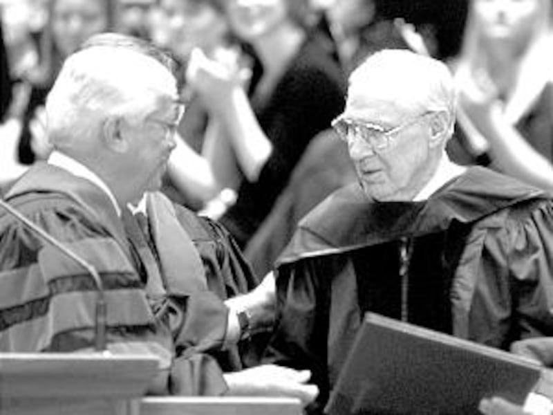 President James E. Faust receives honorary degree from the University of Utah May 10.