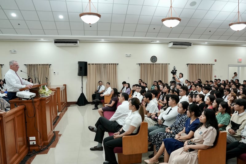 Elder Ulisses Soares of the Quorum of the Twelve Apostles speaks during a young adult devotional in Cebu, Philippines, on May 16, 2026.