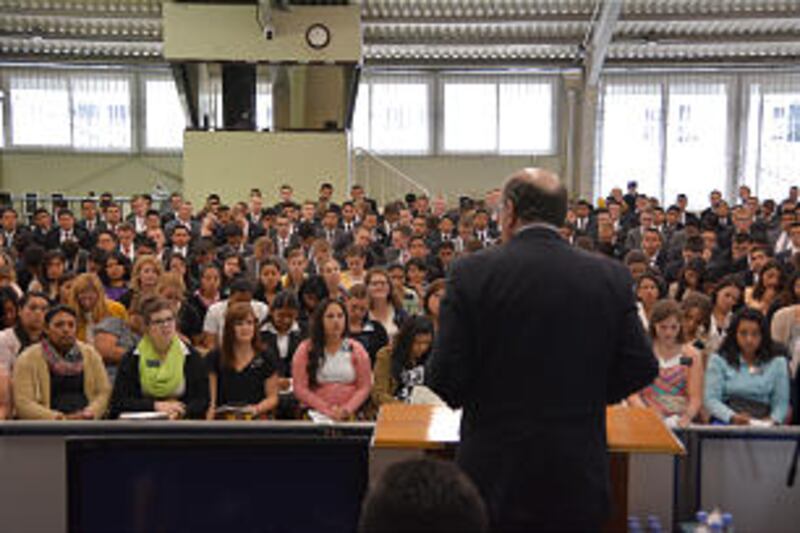 Elder Quentin L. Cook speaks to 970 missionaries from missions in Guatemala City.