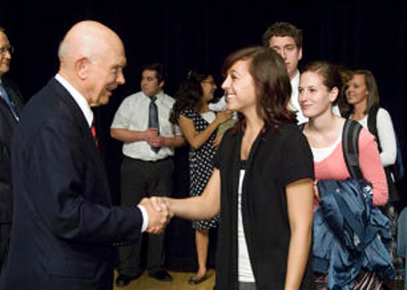 Students line up following the devotional to express appreciation to Elder Dallin H. Oaks.