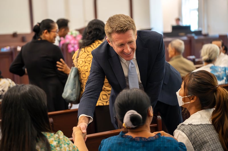 Young Men General President Timothy L. Farnes greets youth before a devotional in Cambodia during a ministry assignment to countries in Asia in May 2026.
