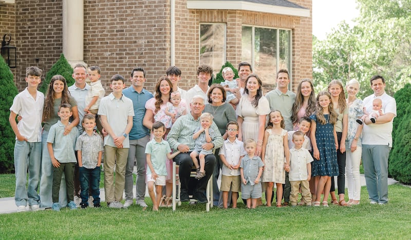 Shawna Edwards — composer of "The Miracle," a new addition to Hymns for Home and Church — smiles for a photo with her extended family in Alpine, Utah, in June 2025.