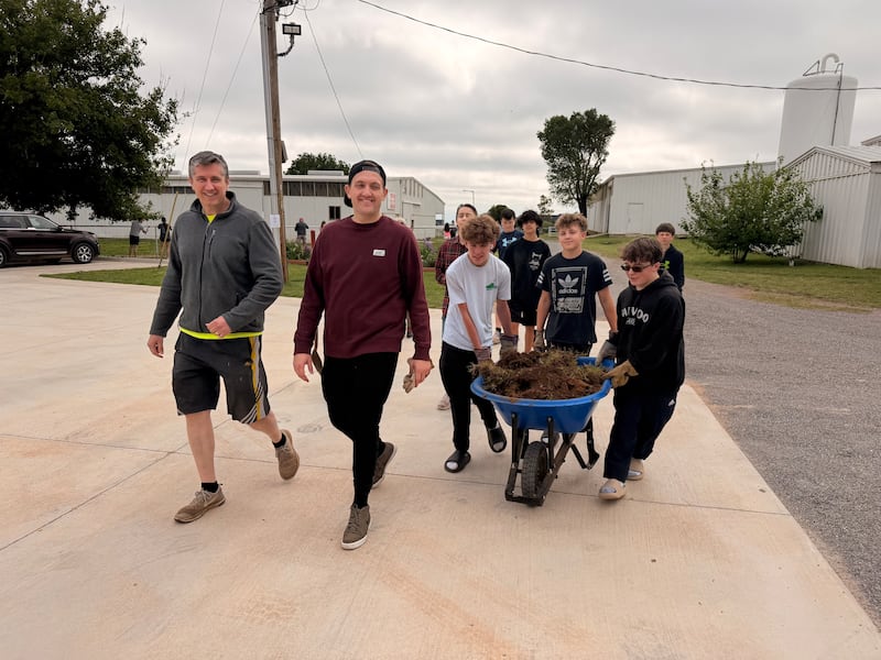 Youth volunteers do yard work at the Savannah Station Therapeutic Riding Program in Yukon Oklahoma for Global Youth Service Day in April 2026.