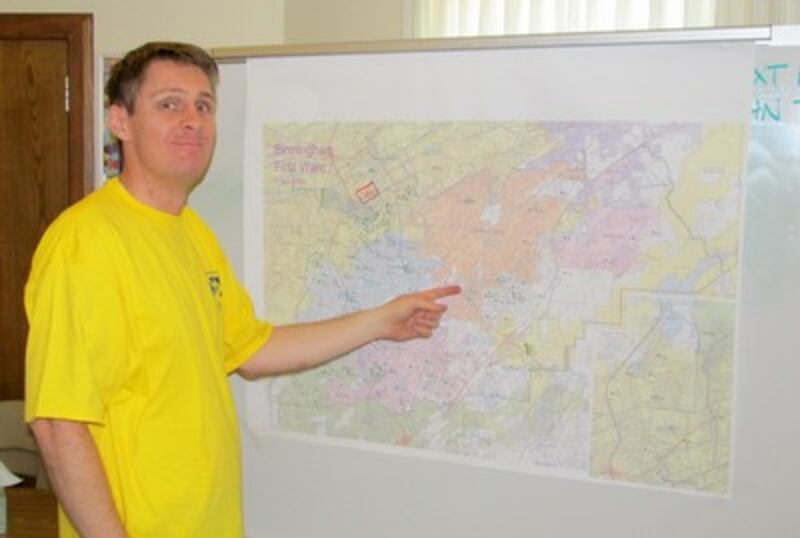 Brother Tyler Wright helps coordinate response in the command center.