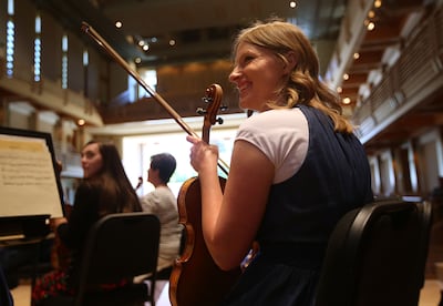 Kerstin Tenney watches the Mormon Tabernacle Choir during soundcheck in Weill Hall at the Green Music Center in Rohnert Park, California, on Wednesday, June 27, 2018.