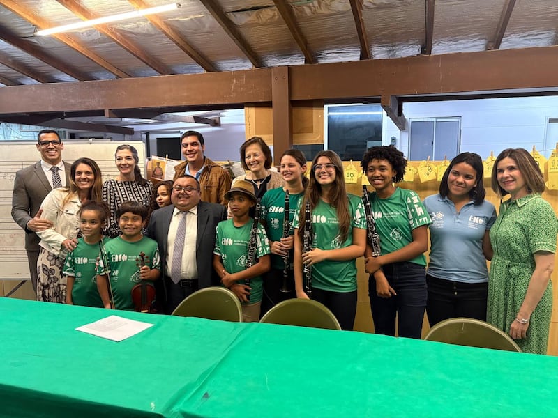 Primary General President Susan H. Porter and Sister Andrea Muñoz Spannaus take a picture with chidlren learning music at Instituto Ayrton Senna in Rio de Janeiro, Brazil, Friday, June 12, 2026.