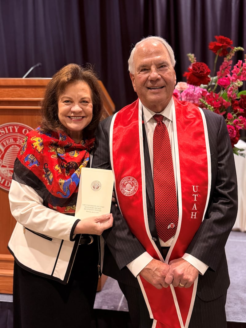 Elder Ronald A. Rasband and Sister Melanie Rasband stand side by side at the Jon M. Huntsman Center at the University of Utah on Wednesday, April 29, 2026, in Salt Lake City.