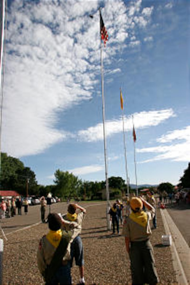 Boy Scouts and Cub Scouts perform flag ceremony outside the Philmont Training Center each morning at
