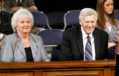 Elder Glen L. Pace, General Authority Seventy, sitting by his wife Jolene, smile at members of the audience prior to speaking during a devotional at BYU.