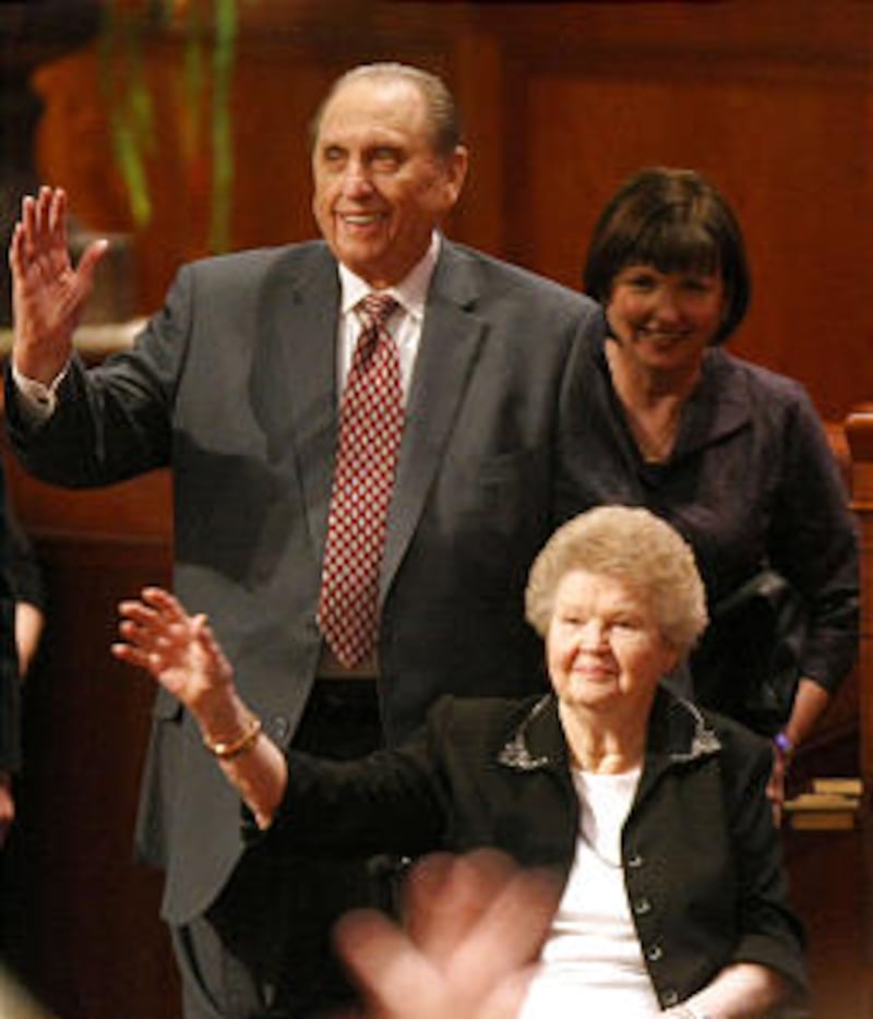 President Thomas S. Monson and his wife Frances leave the General Relief Society Meeting at the Conf