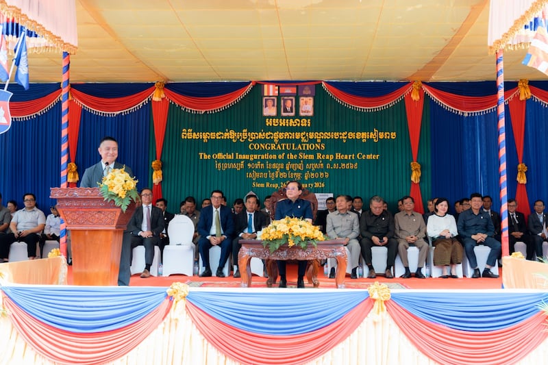 Elder Benjamin M.Z. Tai addresses a large crowd at the celebration of the official opening of the new heart center at the Siem Reap Provincial Referral Hospital in Siem Reap, Cambodia.