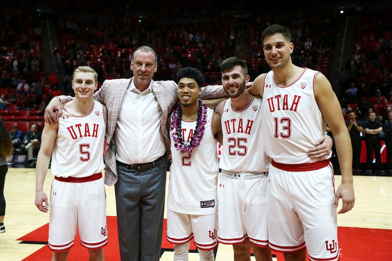 Utah Utes head coach Larry Krystkowiak stands with Parker Van Dyke, Sedrick Barefield, Beau Rydalch and Novak Topalovic during the senior night presentations after the Utah Utes beat the UCLA Bruins at the Huntsman Center in Salt Lake City on Saturday, March 9, 2019.