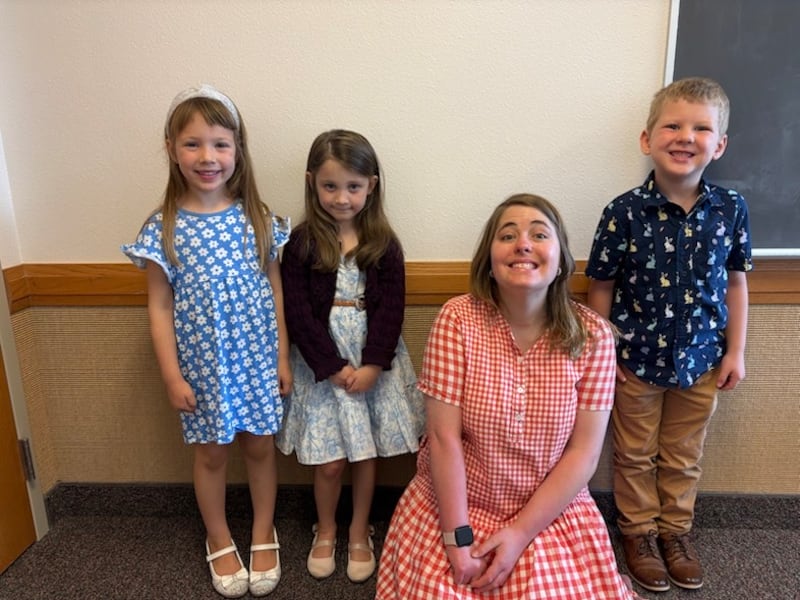 Angela Packard, a member of the San Pedro Ward in the San Antonio Texas North Stake smiles with Primary children after church on March 15, 2026. Packard serves as a Primary substitute teacher.