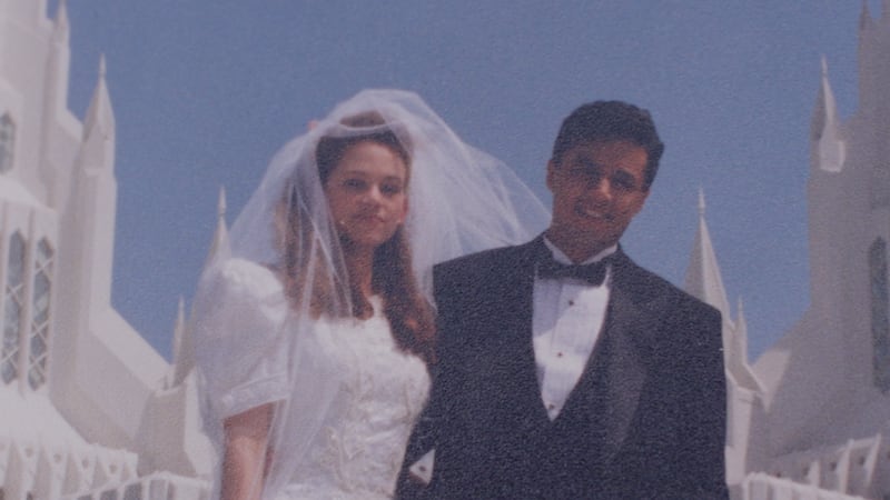 Elizabeth and Giovanni Guanuna's wedding photo at the San Diego California Temple from April 1993.