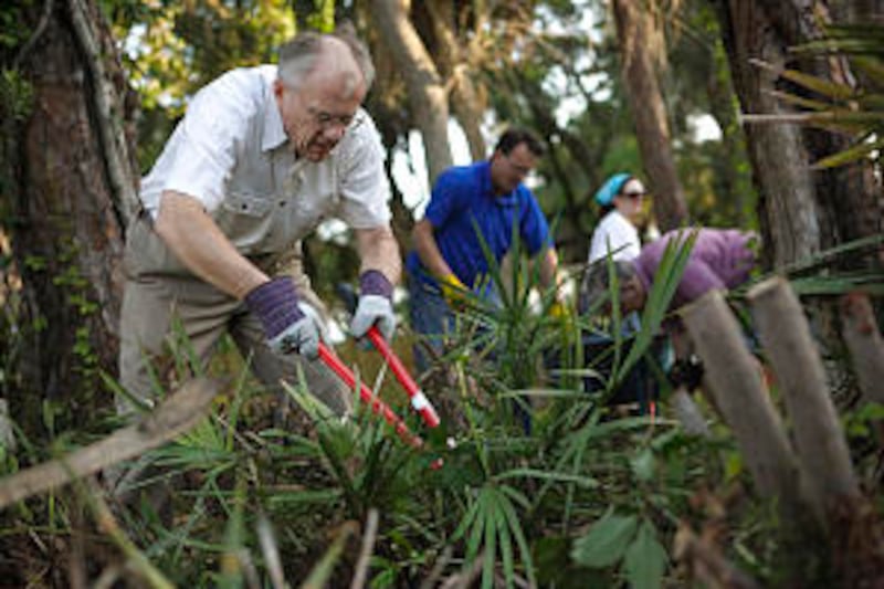 During the Helping Hands and Linking Arms Project on April 25, Kent Linton of the Viera Ward in the