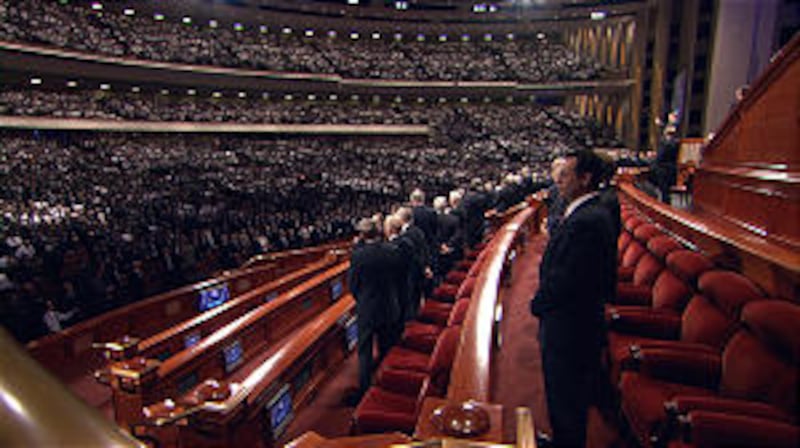 General Authorities join the congregation in singing an intermediate hymn during the priesthood meet