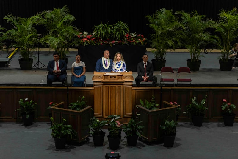 BYU–Hawaii President John S.K. Kauwe III and his wife, Sister Monica Kauwe, speak during the opening devotional of fall semester held in the Cannon Activities Center in Laie, Hawaii, on Sept. 8, 2026.