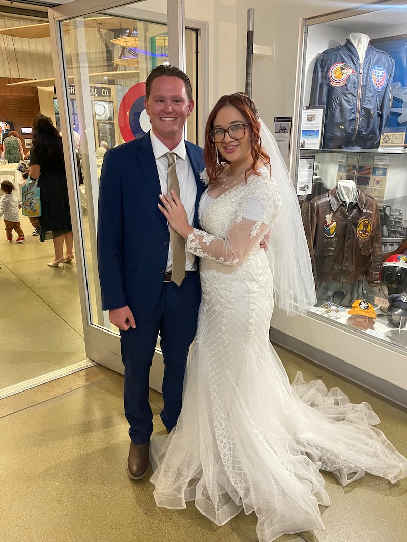 Tryston and Stephanie O'Toole pose for a picture at their wedding reception following their marriage in the Redlands California Temple on Oct. 12, 2024.