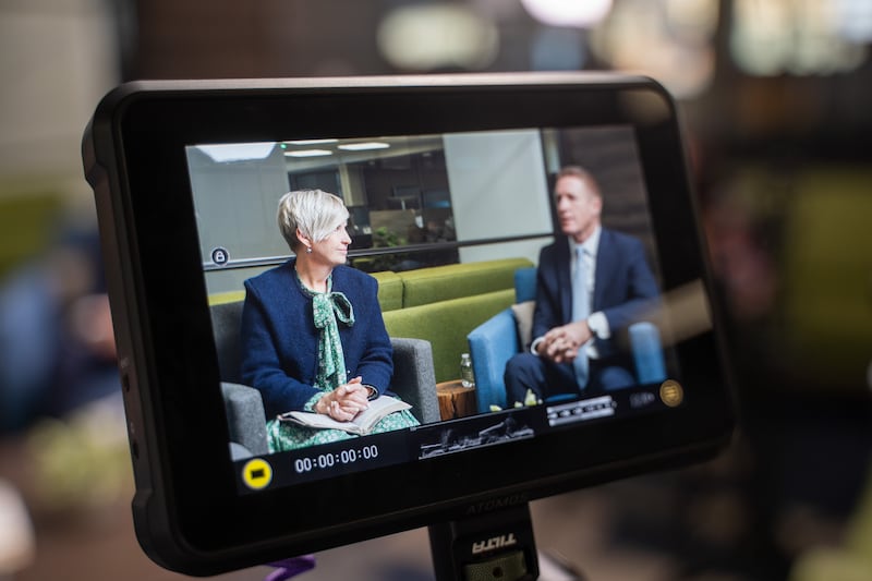President Emily Belle Freeman and President Timothy L. Farnes are seen through a video lens during the taping of the Church News podcast episode available Tuesday, Jan. 27, 2026.