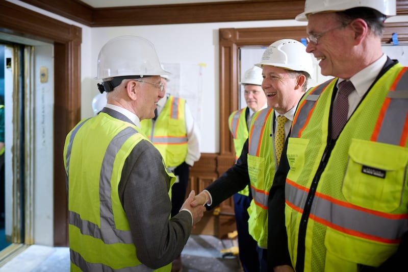 President D. Todd Christofferson, left, greets members of the Presiding Bishopric during a tour of the Salt Lake Temple.