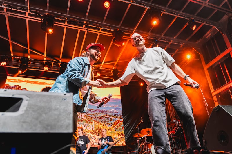 Garon Brett and Patch Crowe shake hands during the Las Vegas Youth Music Festival at UNLV on Saturday, Oct. 17, 2026.