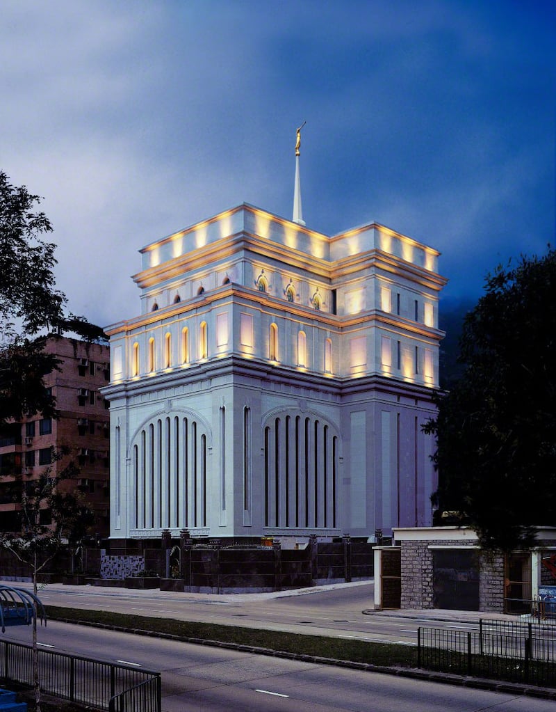 The Hong Kong China Temple with lights at dusk.