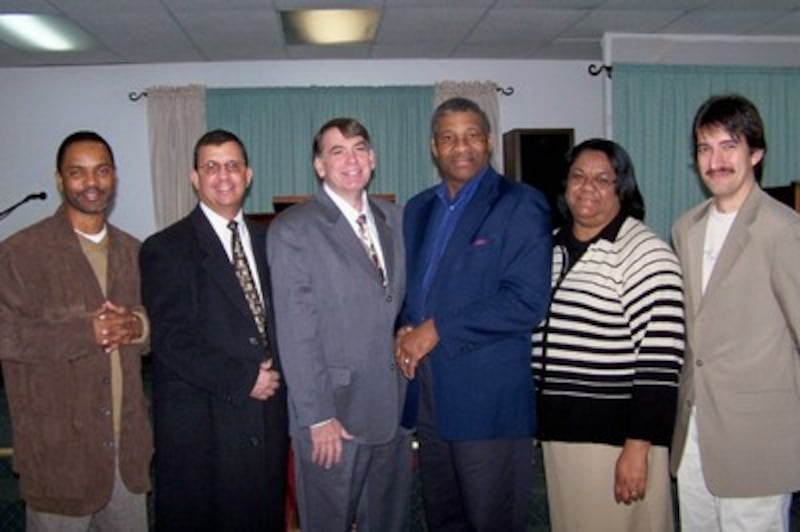 Left to right – Michael A. Friend, LDS Bishop Byron Wilson, LDS Bishop Brandon Bushey, Michael G. J