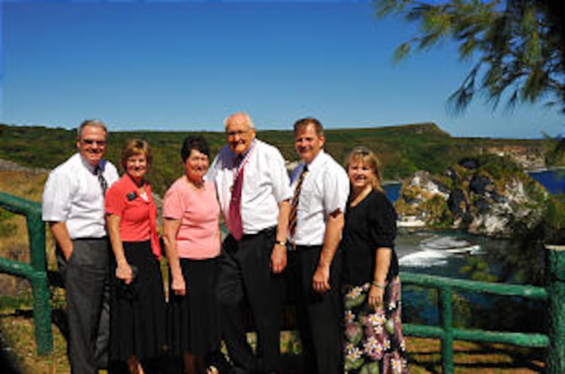 Mission president Michael Dowdle and his wife, Gayla, Elder Perry and his wife, Barbara, and Elder G