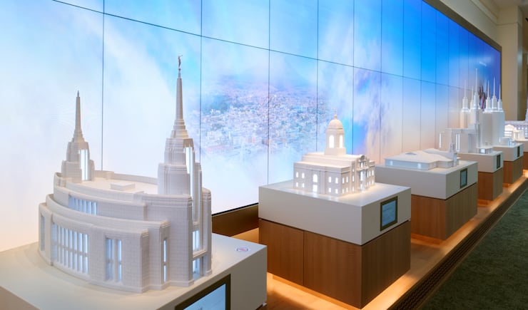 A display of 11 built-to-scale miniature temples on the lower level of the Temple Square Visitors’ Center represents the global footprint of houses of the Lord.