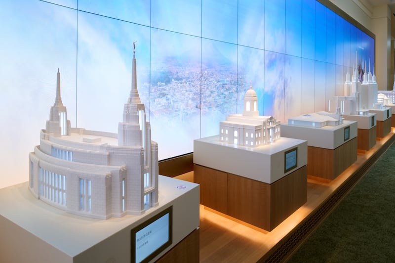 A display of 11 built-to-scale miniature temples on the lower level of the Temple Square Visitors’ Center represents the global footprint of houses of the Lord.