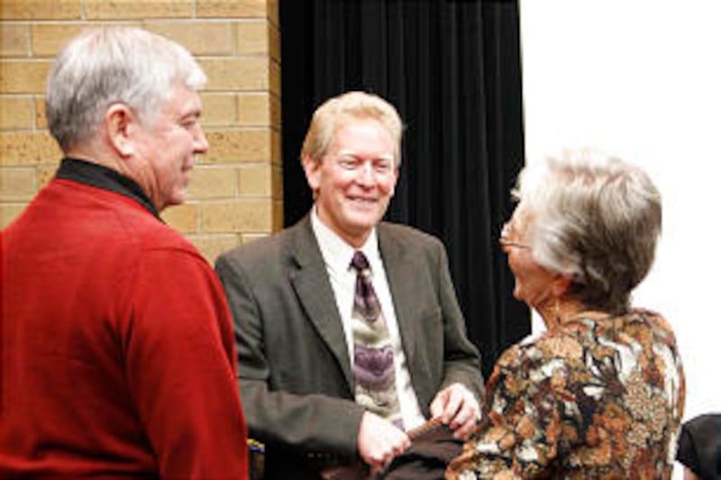 Dean Busby, professor in the School of Family Life at Brigham Young University, speaks to audience m