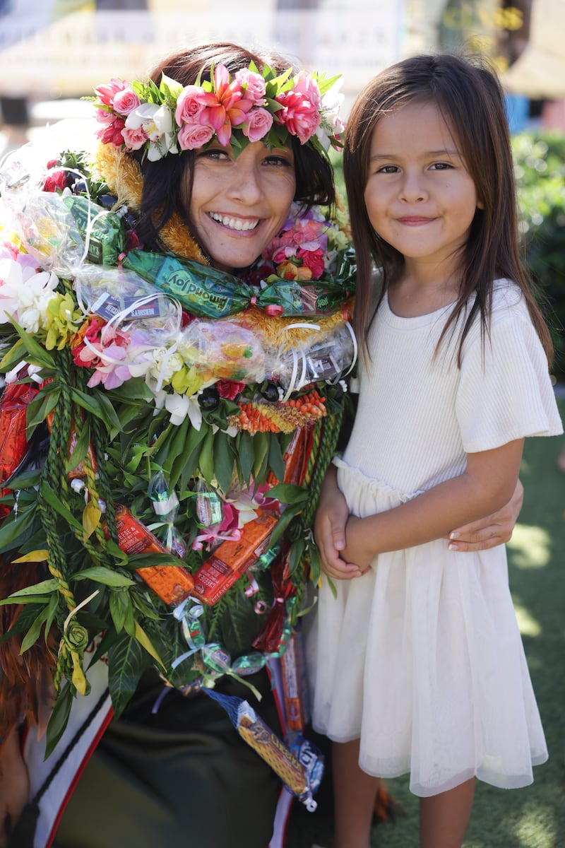 BYU–Hawaii graduates celebrate with family and friends outside the Cannon Activities Center in Laie, Hawaii, following commencement on Friday, Dec. 12, 2025.
